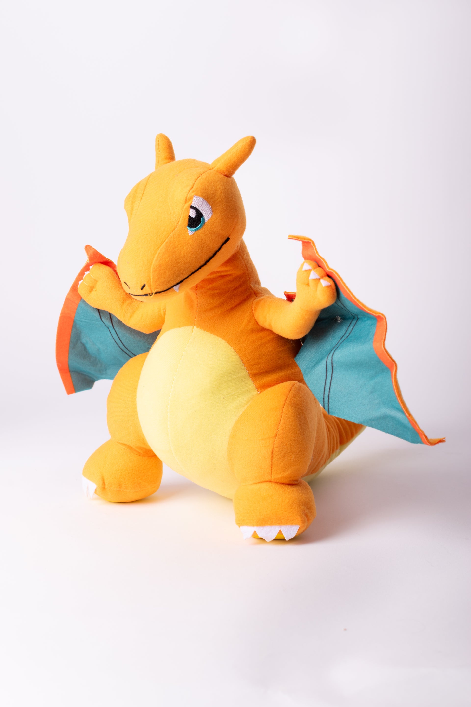 Pikachu Plush dressed as a Charizard